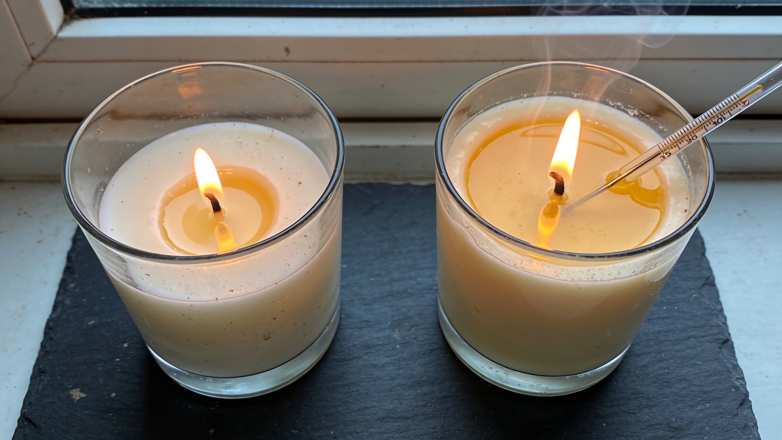 Two waxes, same fragrance, same wick, twenty minutes in. The pool on the right is doing more work.